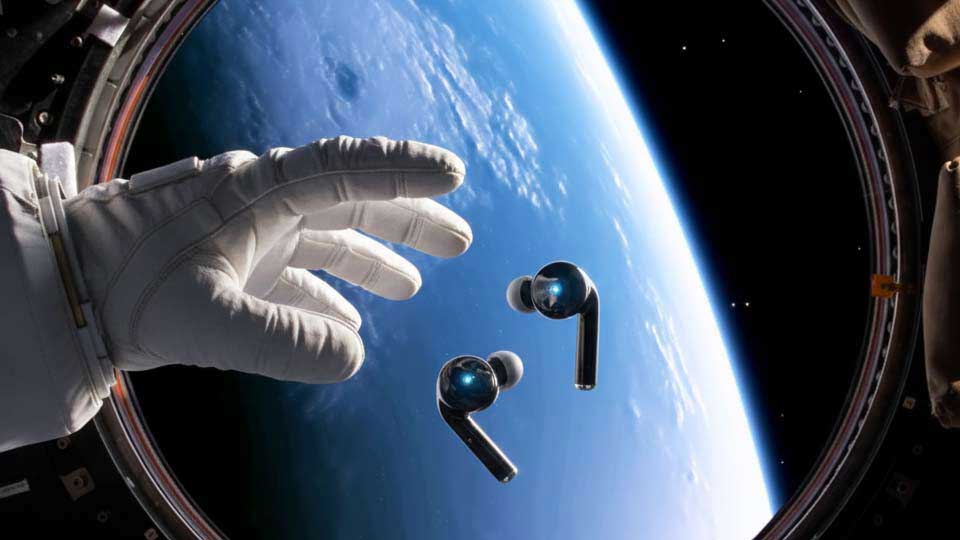 Spacraft porthole with glove and earbuds